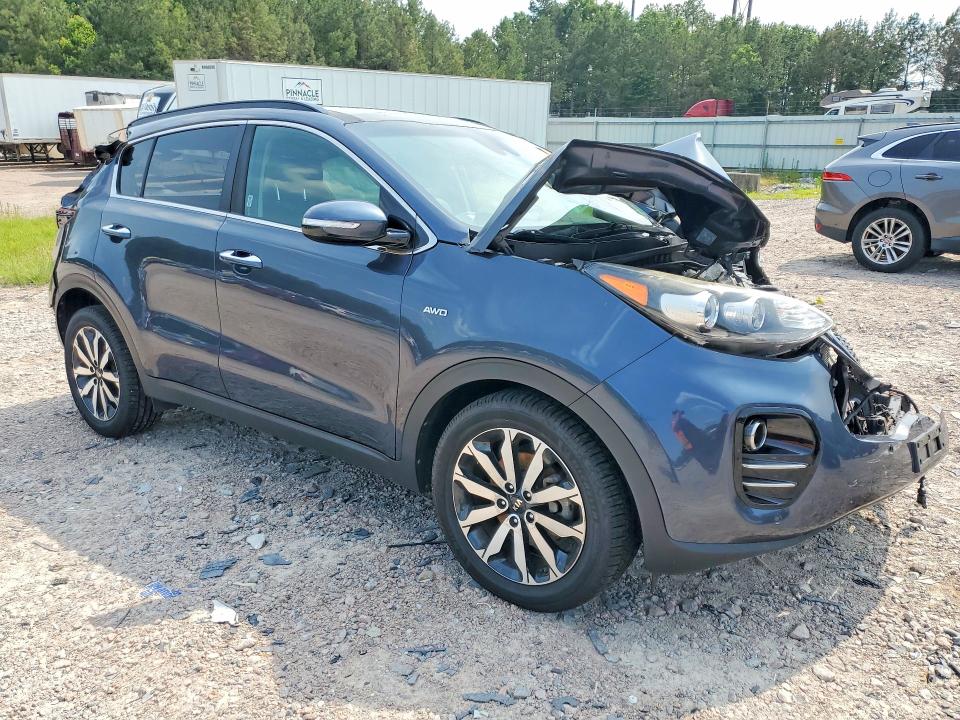 2018 Kia Sportage VIN KNDPNCAC5J7309935 COPART salvage auction — ALL OVER, VA - CERT OF TITLE - SALVAGE, sold $525 on 2026-07-20 (photo 4)