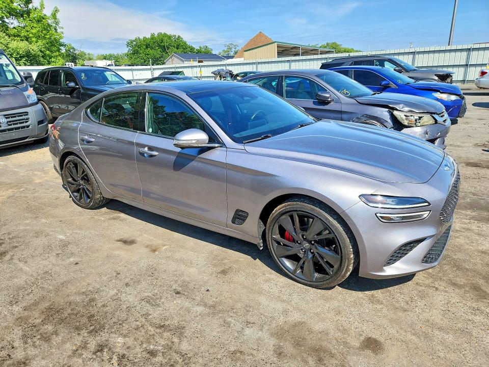 2023 Genesis G70 VIN KMTG54TE3PU130938 COPART salvage auction — REAR END, Salvage Title, sold $7,700 on 2026-07-28 (photo 4)