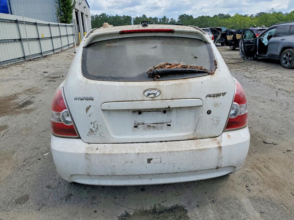 2011 Hyundai Accent VIN KMHCM3AC1BU186571 COPART salvage auction — NORMAL WEAR, GA - BILL OF SALE, sold $350 on 2026-07-30 (photo 6)