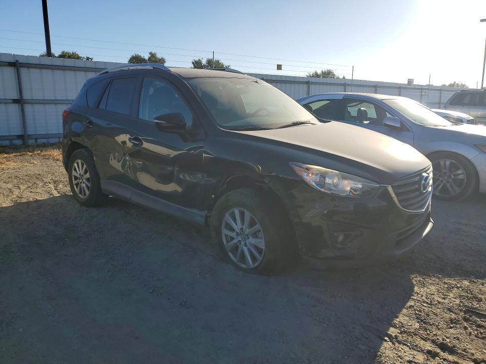 2016 Mazda Cx-5 VIN JM3KE2CY2G0805829 COPART salvage auction — FRONT END, Ca - Salvage Certificate, sold $2,100 on 2026-07-09 (photo 4)