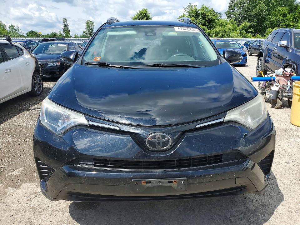 2018 Toyota Rav4 VIN 2T3ZFREV4JW476554 COPART salvage auction — WATER/FLOOD, ON - PERMIT NO BRAND - UNFIT, sold $8,400 on 2026-07-02 (photo 5)