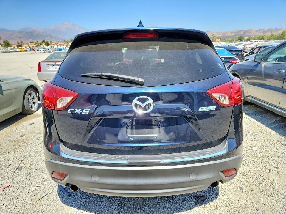 2016 Mazda VIN JM3KE2CY0G0834990 COPART salvage auction — SIDE, Ca - Salvage Certificate, sold $2,950 on 2026-07-15 (photo 6)