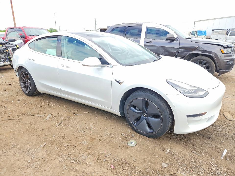 2020 Tesla Model 3 VIN 5YJ3E1EAXLF736987 COPART salvage auction — REAR END, Mi - Certificate Of Title, sold $9,300 on 2026-07-28 (photo 4)