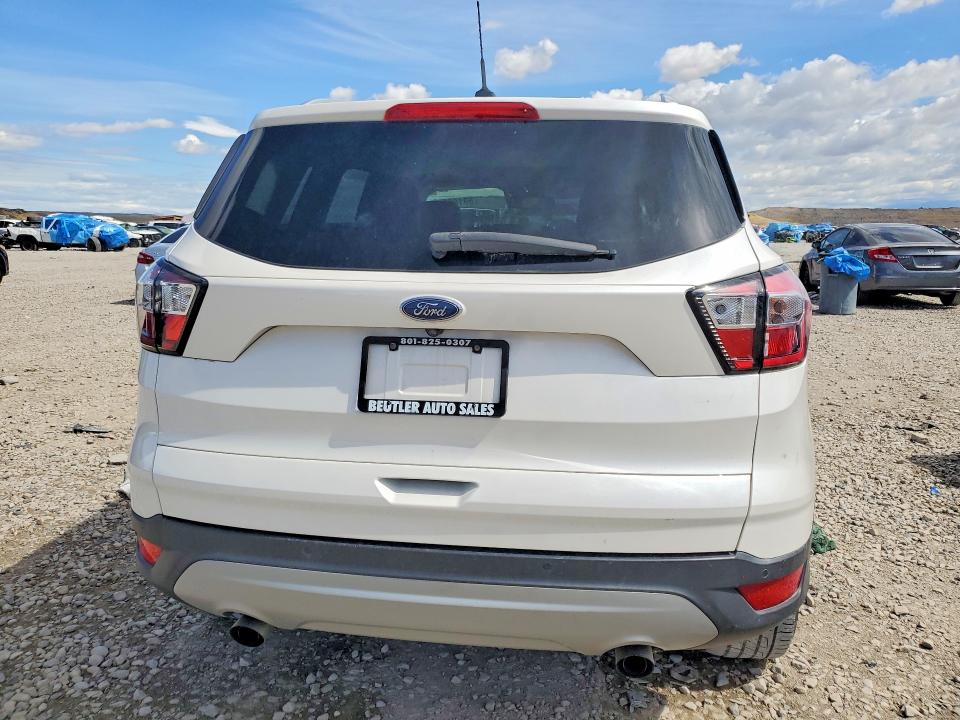 2017 Ford Escape VIN 1FMCU9J97HUE04173 COPART salvage auction — MINOR DENT/SCRATCHES, Ut - Cert Of Title-Rebuilt/Restored, sold $425 on 2026-07-04 (photo 6)