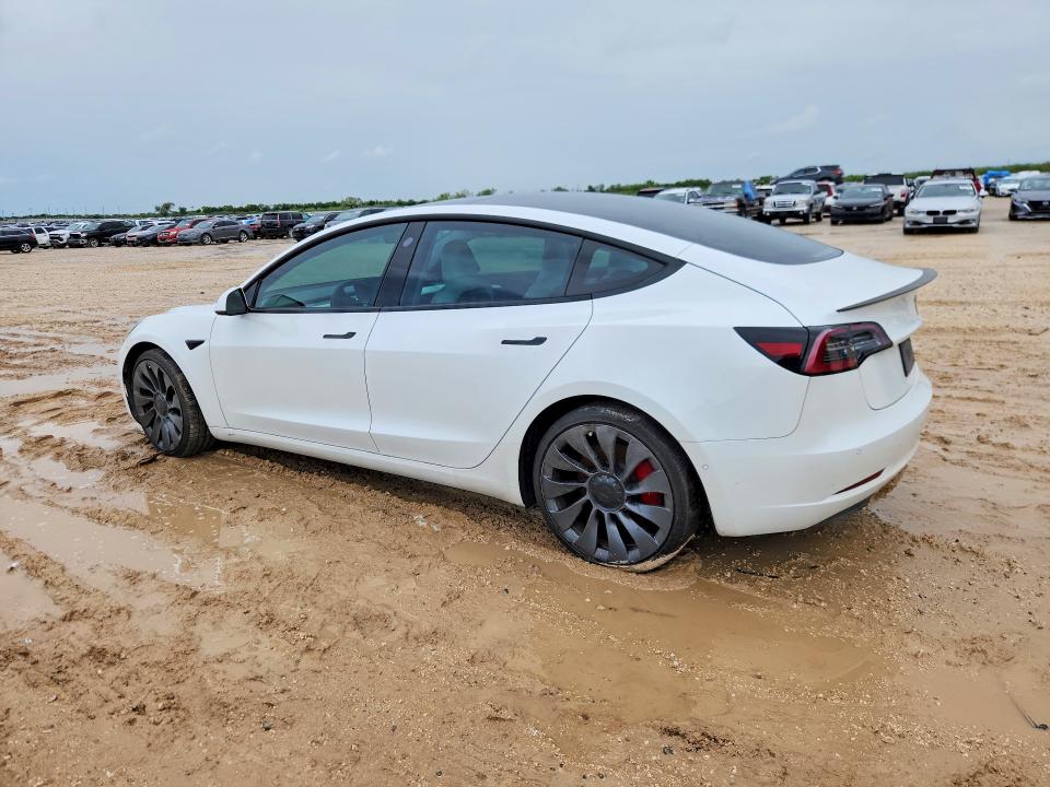 2021 Tesla Model 3 VIN 5YJ3E1ECXMF030816 COPART salvage auction — MINOR DENT/SCRATCHES, Wv - Certificate Of Title, sold $9,500 on 2026-07-09 (photo 2)
