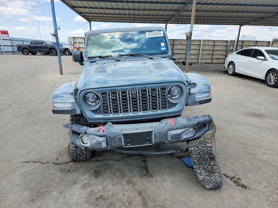 2026 Jeep Gladiator VIN 1C6RJTBG0TL160972 COPART salvage auction — ALL OVER, TX - SALVAGE VEHICLE TITLE (P), sold $11,800 on 2026-08-28 (photo 5)