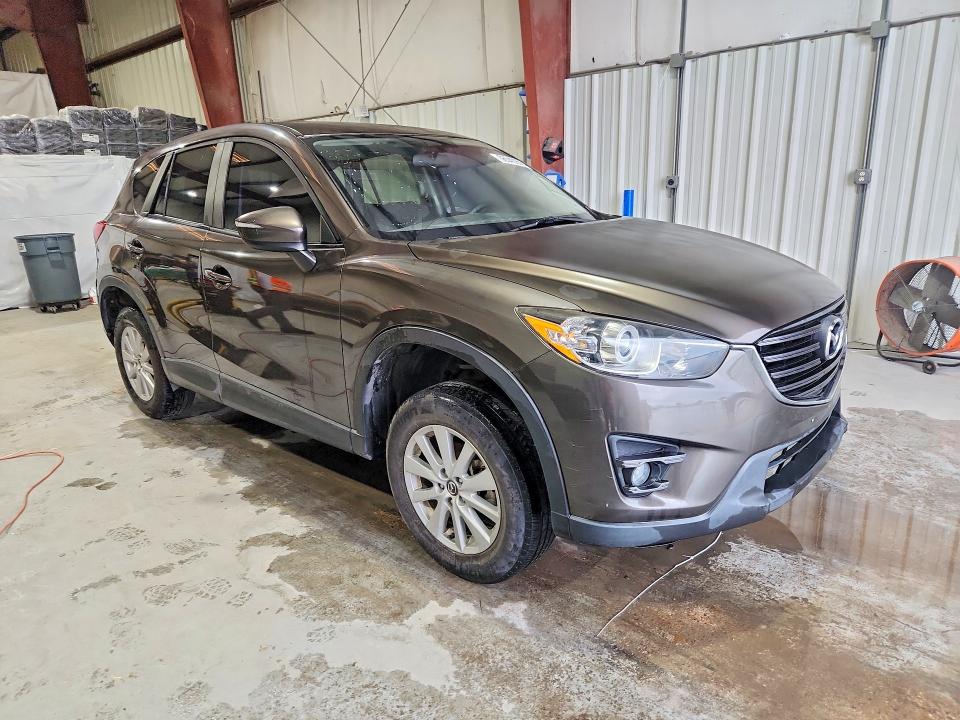 2016 Mazda Cx-5 VIN JM3KE2CY0G0908490 COPART salvage auction — MINOR DENT/SCRATCHES, Nm - Certificate Of Title (P), sold $1,500 on 2026-07-15 (photo 4)
