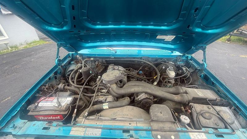 1990 Ford Bronco VIN 1FMEU15H7LLB17409 COPART salvage auction — NORMAL WEAR, Tx - Cert Of Title-Rebuilt Salvage (P), sold $3,050 on 2026-07-02 (photo 7)