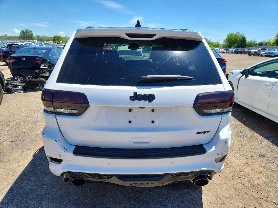 2017 Jeep Grand cherokee VIN 1C4RJFDJ9HC964245 COPART salvage auction — VANDALISM, ON - PERMIT NO BRAND - UNFIT, sold $3,600 on 2026-07-30 (photo 6)