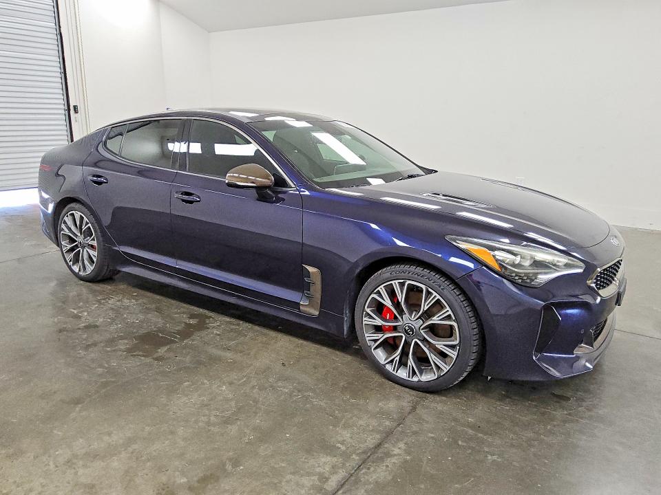 2020 Kia Stinger VIN KNAE35LC4L6085097 COPART salvage auction — MINOR DENT/SCRATCHES, TX - CERTIFICATE OF TITLE (P), sold $18,000 on 2026-07-23 (photo 4)