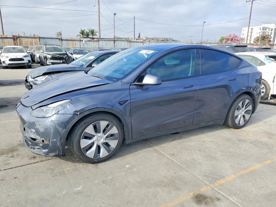 2023 Tesla Model y VIN 7SAYGDEE4PF789875 COPART salvage auction — FRONT END, Ca - Salvage Certificate, sold $12,800 on 2026-07-20 (photo 1)