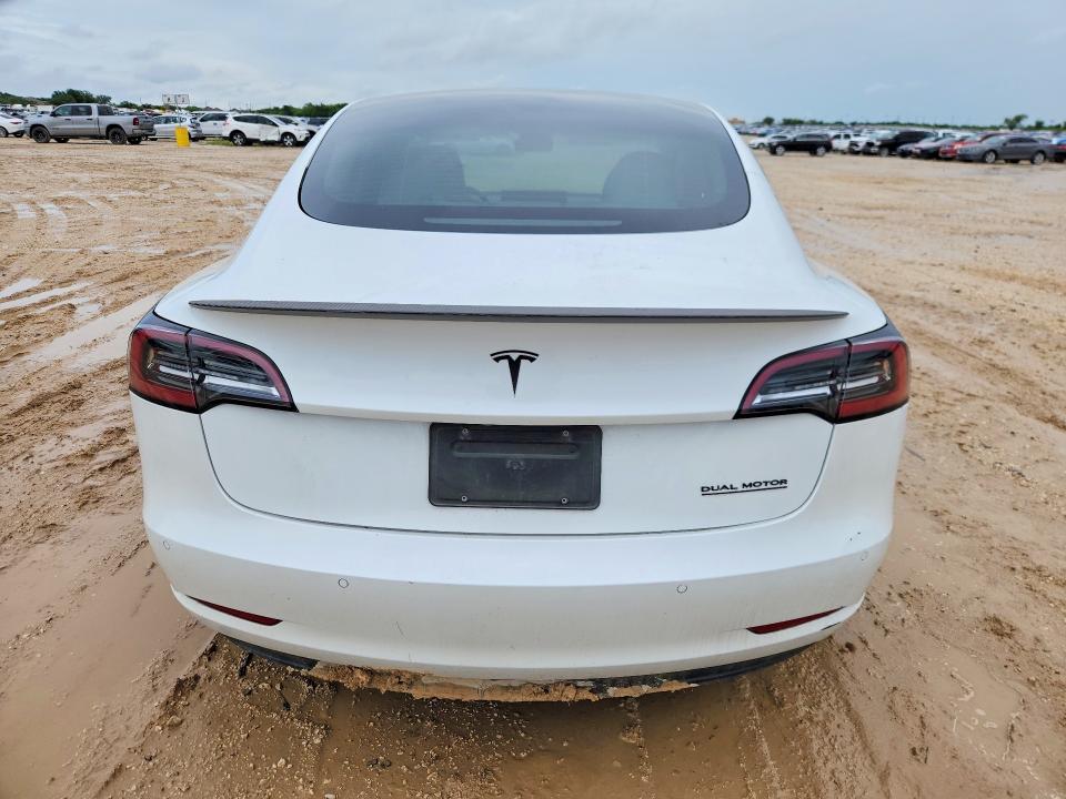 2021 Tesla Model 3 VIN 5YJ3E1ECXMF030816 COPART salvage auction — MINOR DENT/SCRATCHES, Wv - Certificate Of Title, sold $9,500 on 2026-07-09 (photo 6)
