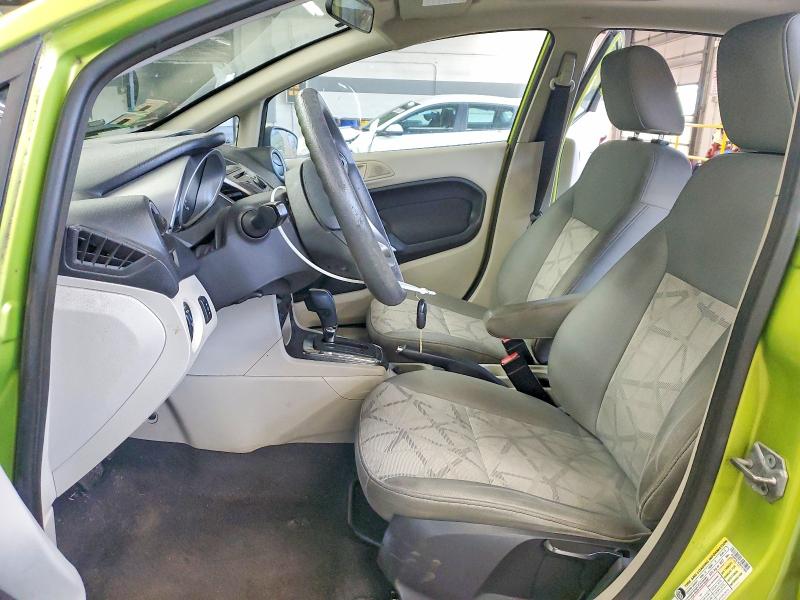 2012 Ford Fiesta VIN 3FADP4EJ9CM101860 COPART salvage auction — MINOR DENT/SCRATCHES, Il - Certificate Of Title, sold $325 on 2026-07-09 (photo 7)