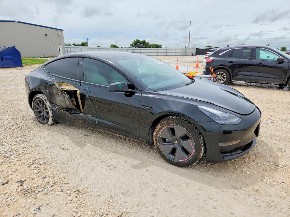 2021 Tesla VIN 5YJ3E1EA6MF921619 COPART salvage auction — SIDE, TX - SALVAGE VEHICLE TITLE (P), sold $5,700 on 2026-07-23 (photo 4)