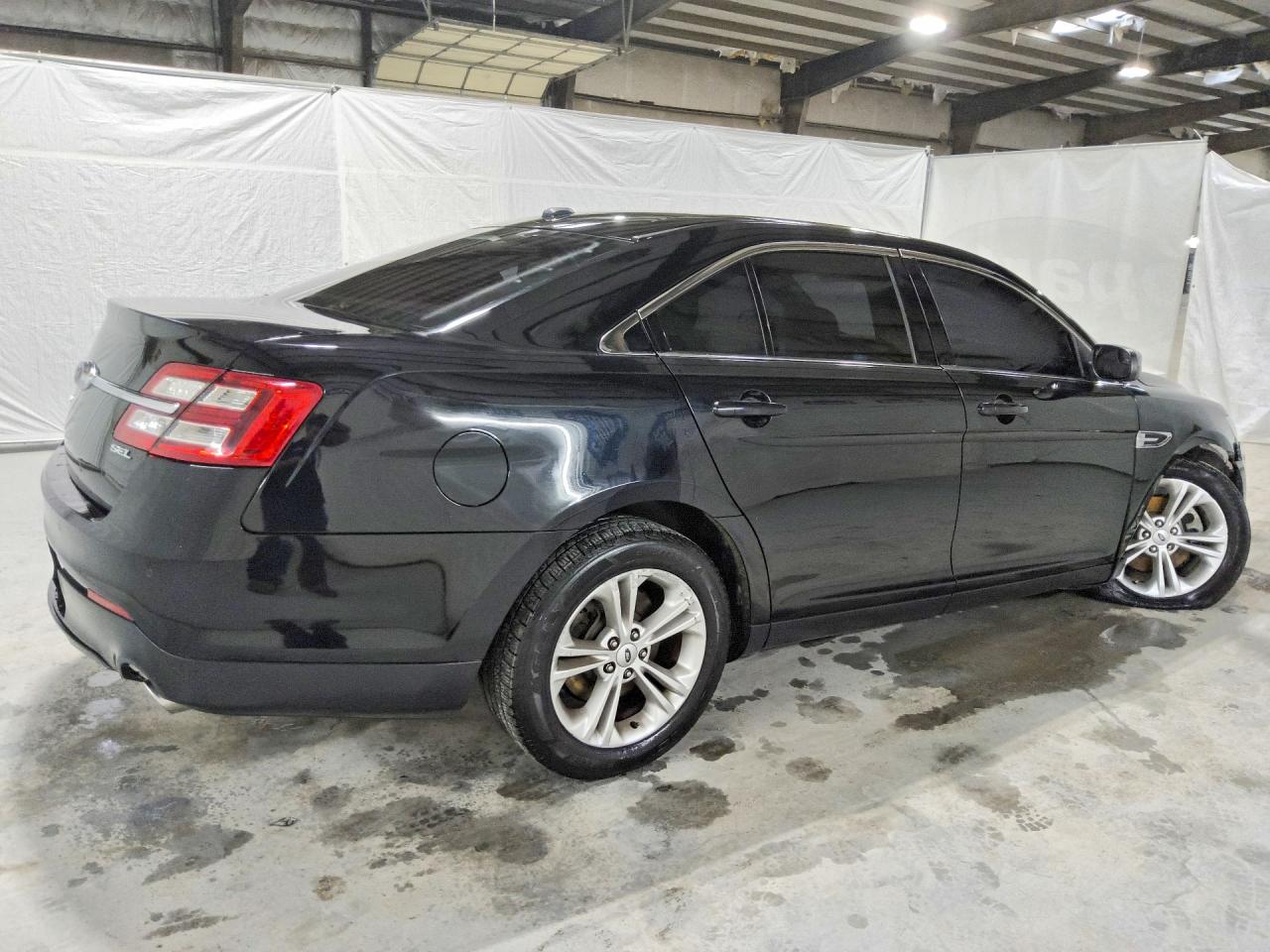 2018 Ford Taurus VIN 1FAHP2E80JG120162 COPART salvage auction — Undercarriage, MS - CERTIFICATE OF TITLE, sold $850 on 2026-07-09 (photo 3)