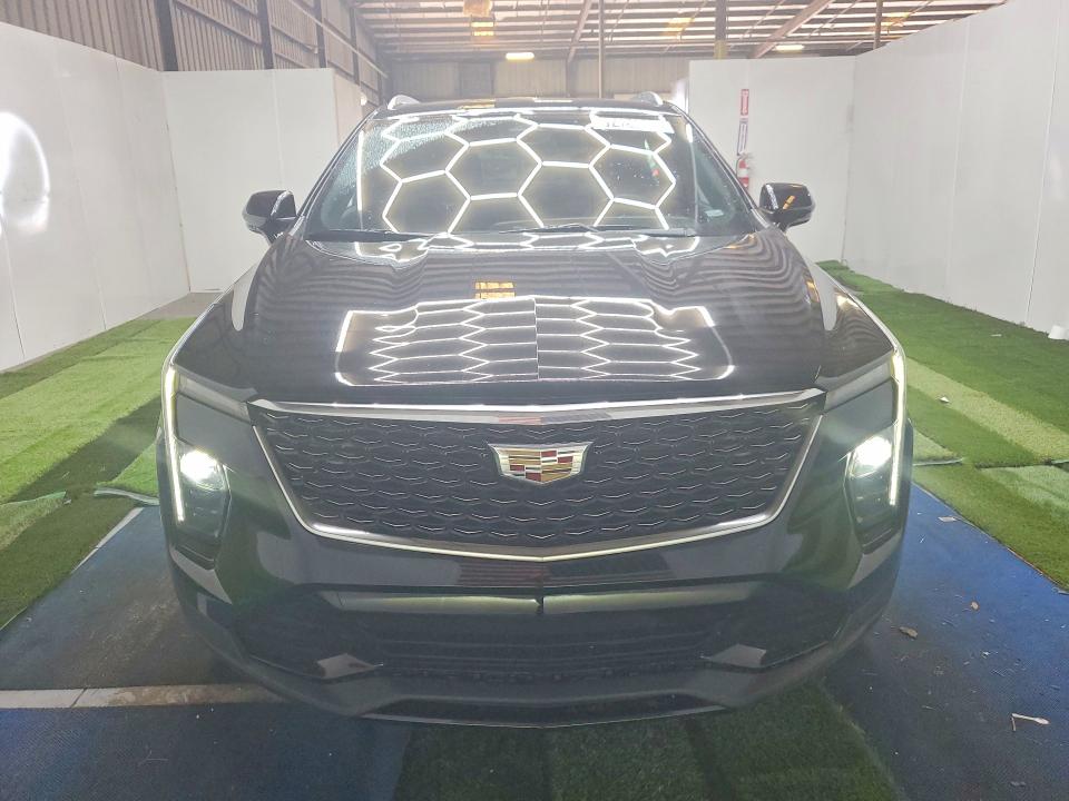 2024 Cadillac Xt4 VIN 1GYFZCR4XRF213291 COPART salvage auction — MINOR DENT/SCRATCHES, Ga - Certificate Of Title (P), sold $17,200 on 2026-07-15 (photo 5)