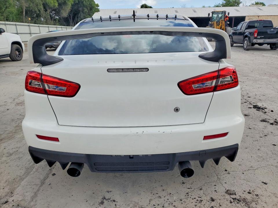 2014 Mitsubishi Lancer evolution VIN JA32W8FVXEU021204 COPART salvage auction — MECHANICAL, Tx - Certificate Of Title (P), sold $14,500 on 2026-07-28 (photo 6)