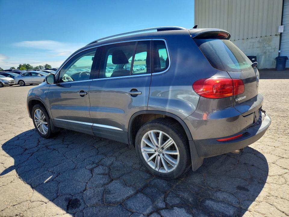 2014 Volkswagen Tiguan VIN WVGBV3AX7EW559231 COPART salvage auction — REAR END, Or - Salvage Title Certificate, sold $1,450 on 2026-07-27 (photo 2)