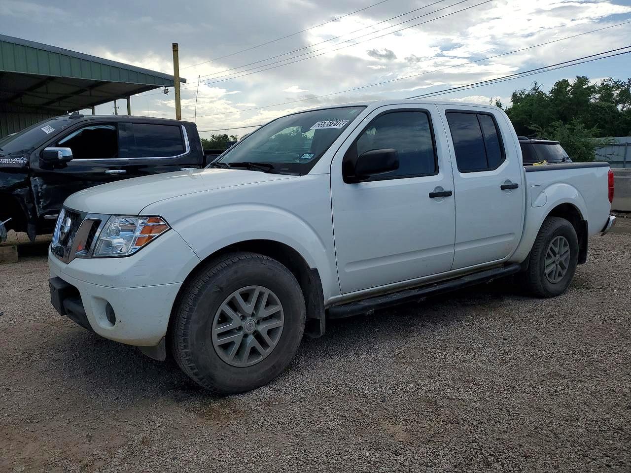 2019 Nissan Frontier VIN 1N6DD0ER0KN754516 COPART salvage auction — Minor Dent/Scratches, TX - CERTIFICATE OF TITLE, sold $13,800 on 2026-07-09 (photo 1)