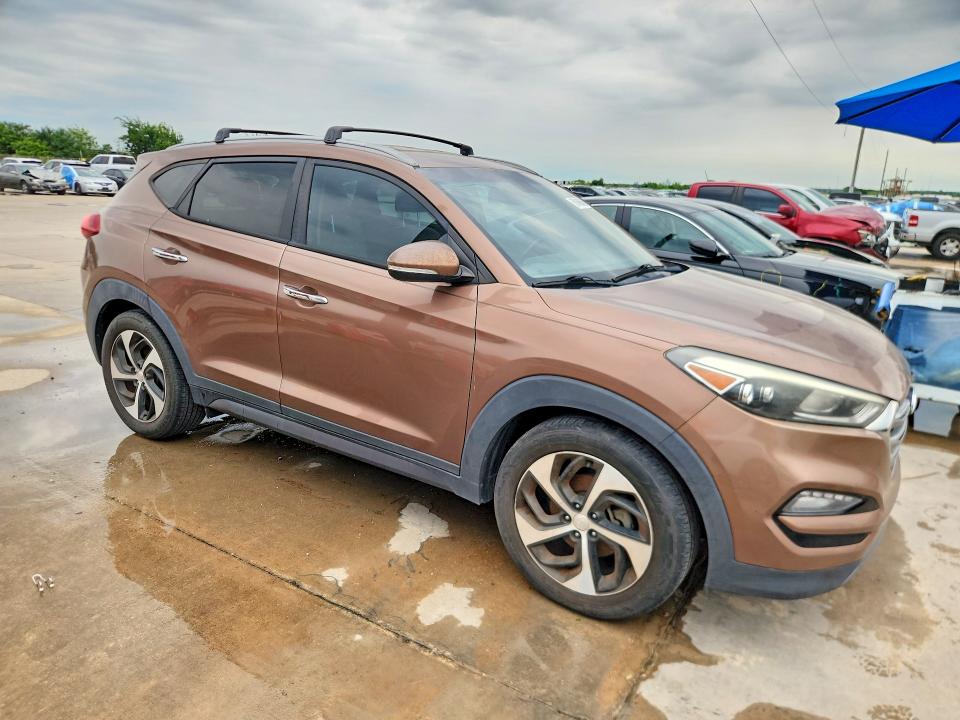 2016 Hyundai Tucson VIN KM8J33A29GU175164 COPART salvage auction — NORMAL WEAR, Fl - Certificate Of Title, sold $2,000 on 2026-07-27 (photo 4)