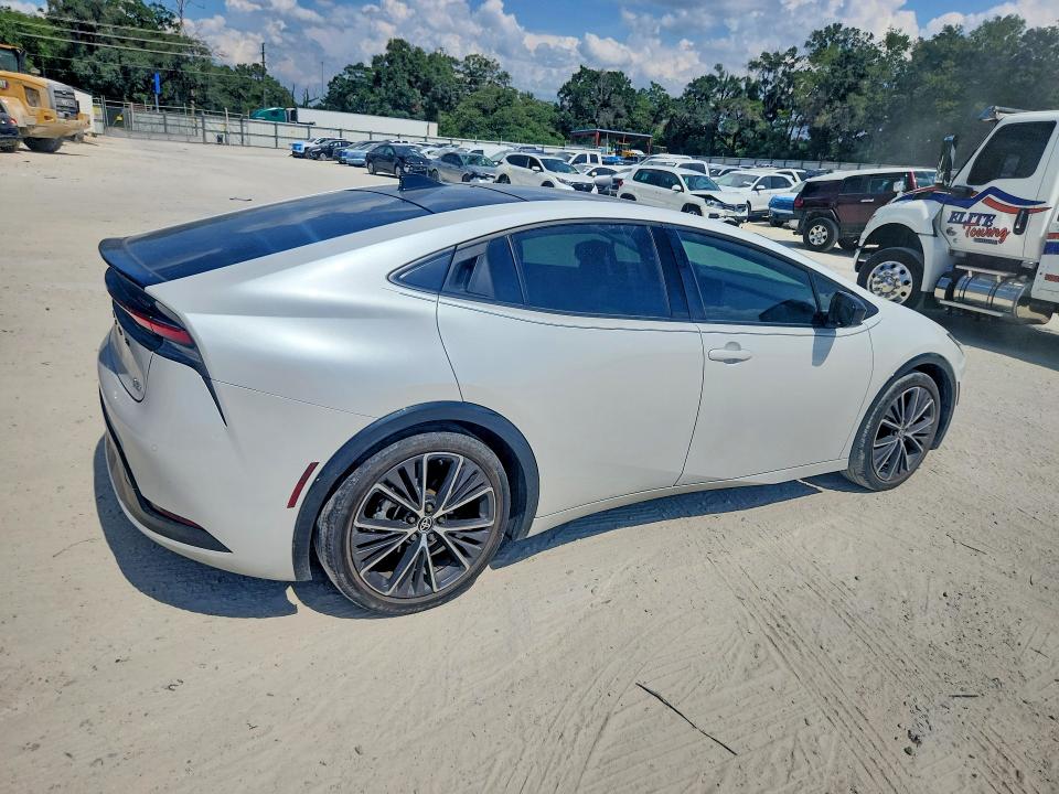 2023 Toyota Prius VIN JTDACAAU5P3011474 COPART salvage auction — MINOR DENT/SCRATCHES, LA - CERTIFICATE OF TITLE, sold $18,300 on 2026-07-23 (photo 3)