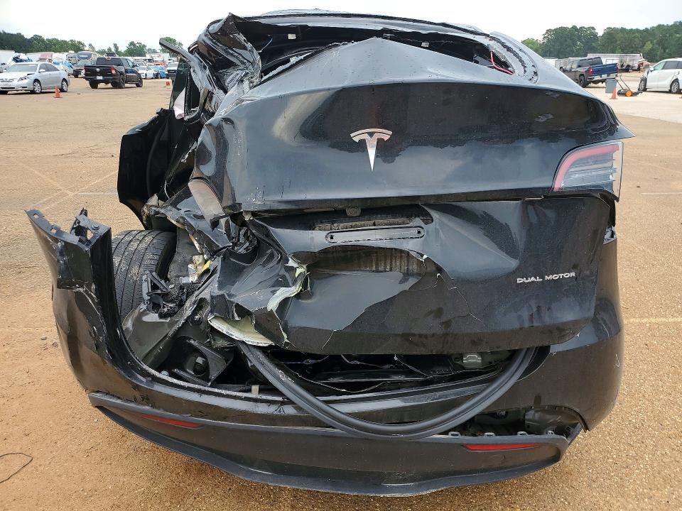 2023 Tesla VIN 7SAYGDEE8PA146961 COPART salvage auction — REAR END, TX - SALVAGE VEHICLE TITLE (P), sold $6,300 on 2026-07-20 (photo 6)