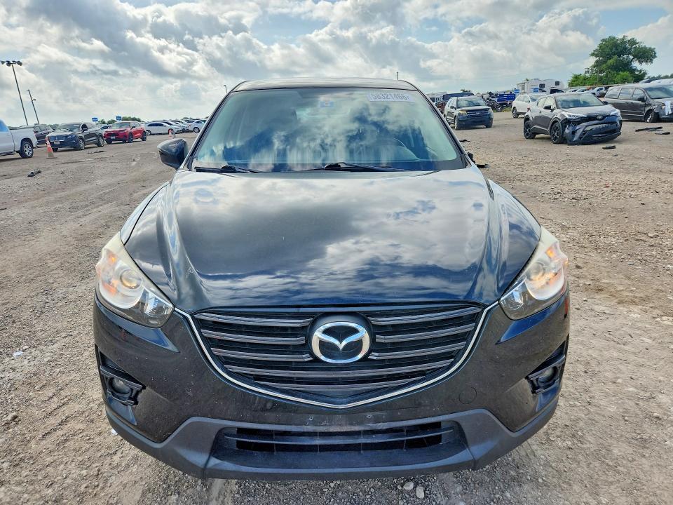 2016 Mazda VIN JM3KE2CY4G0606927 COPART salvage auction — REAR END, Tx - Salvage Vehicle Title, sold $80 on 2026-07-29 (photo 5)