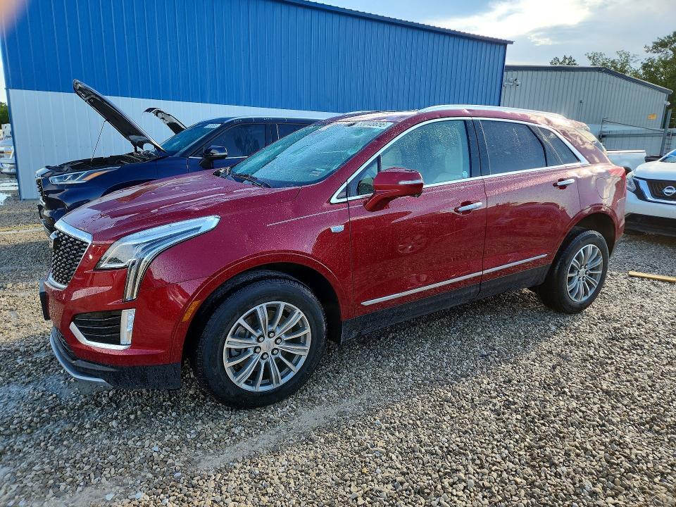 2020 Cadillac Xt5 VIN 1GYKNDRSXLZ140430 COPART salvage auction — HAIL, Mo - Certificate Of Title, sold $10,600 on 2026-08-19 (photo 1)