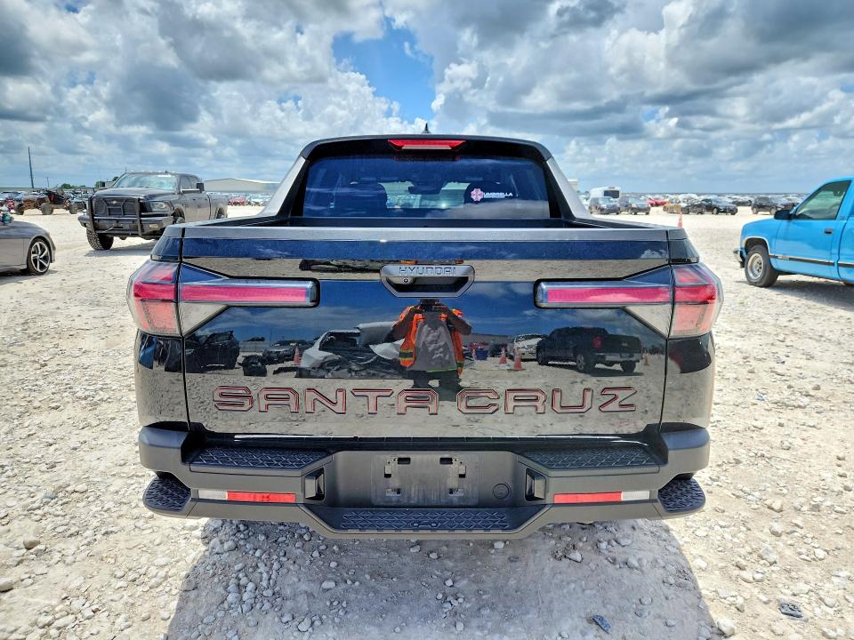 2024 Hyundai Santa cruz VIN 5NTJB4DE3RH112532 COPART salvage auction — SIDE, Tx - Salvage Vehicle Title, sold $6,500 on 2026-07-16 (photo 6)