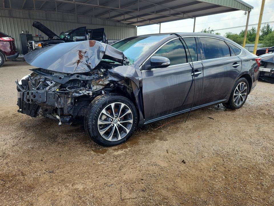 2018 Toyota Avalon VIN 4T1BK1EB4JU282698 COPART salvage auction — FRONT END, TX - SALVAGE VEHICLE TITLE, sold $2,600 on 2026-09-10 (photo 1)