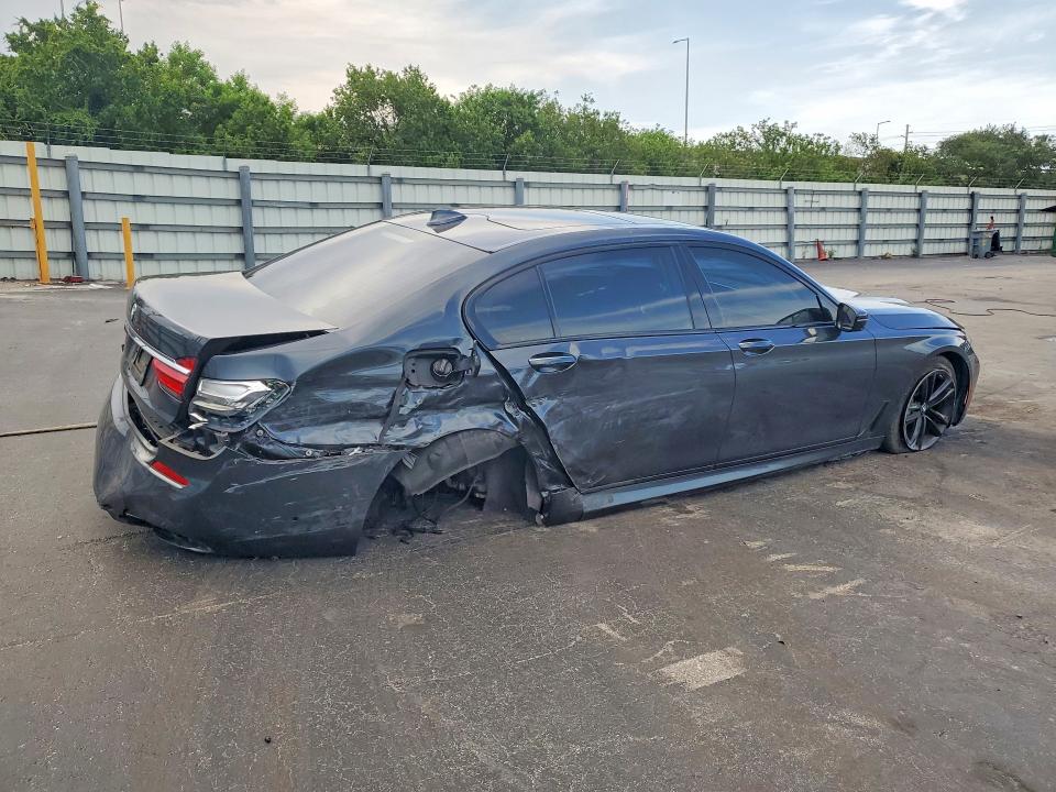 2016 BMW 7er VIN WBA7F2C52GG418655 COPART salvage auction — SIDE, Fl - Cert Of Title Slvg Rebuildable, sold $5,000 on 2026-07-08 (photo 3)