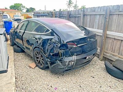 2018 Tesla Model 3 VIN 5YJ3E1EA8JF010171 COPART salvage auction — ALL OVER, Fl - Cert Of Title Slvg Rebuildable (P), sold $800 on 2026-07-07 (photo 3)