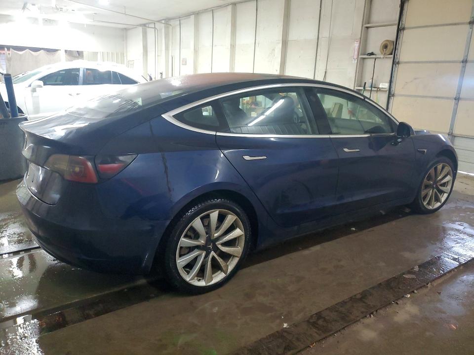 2018 Tesla Model 3 VIN 5YJ3E1EAXJF013699 COPART salvage auction — BURN, Tn - Salvage Certificate, sold $7,100 on 2026-07-07 (photo 3)