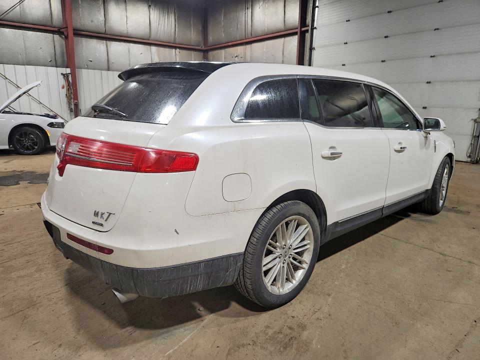2013 Lincoln Mkt VIN 2LMHJ5AT2DBL57058 COPART salvage auction — MECHANICAL, Ak - Certificate Of Vehicle Title, sold $25 on 2026-07-21 (photo 3)