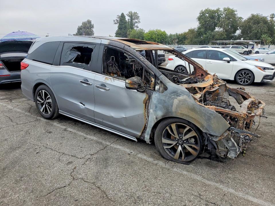 2018 Honda Odyssey VIN 5FNRL6H98JB010430 COPART salvage auction — BURN, Mi - Dis/Dlr/Exp Only Salvage Title, sold $60 on 2026-07-10 (photo 4)