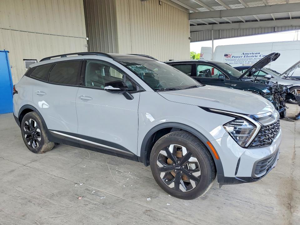 2024 Kia Sportage VIN 5XYK6CDF6RG189705 COPART salvage auction — SIDE, Fl - Cert Of Title Slvg Rebuildable, sold $4,850 on 2026-07-22 (photo 4)