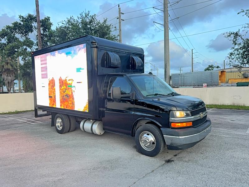 2019 Chevrolet Express VIN 1HA3GRCG0KN000104 COPART salvage auction — NORMAL WEAR, Fl - Cert Of Title-Rebuilt (P), sold $45,250 on 2026-07-14 (photo 1)