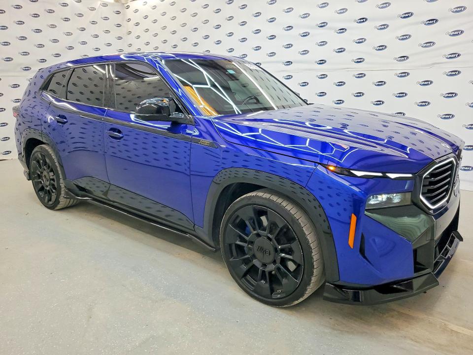 2023 BMW Xm VIN 5YM23CS0XP9S15459 COPART salvage auction — WATER/FLOOD, Tx - Cert Of Title-Reblt Slvg Flood, sold $83,000 on 2026-07-28 (photo 4)