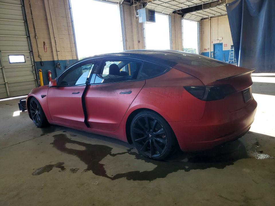 2020 Tesla Model 3 VIN 5YJ3E1EB8LF667046 COPART salvage auction — BURN, Mi - Certificate Of Title, sold $550 on 2026-07-28 (photo 2)