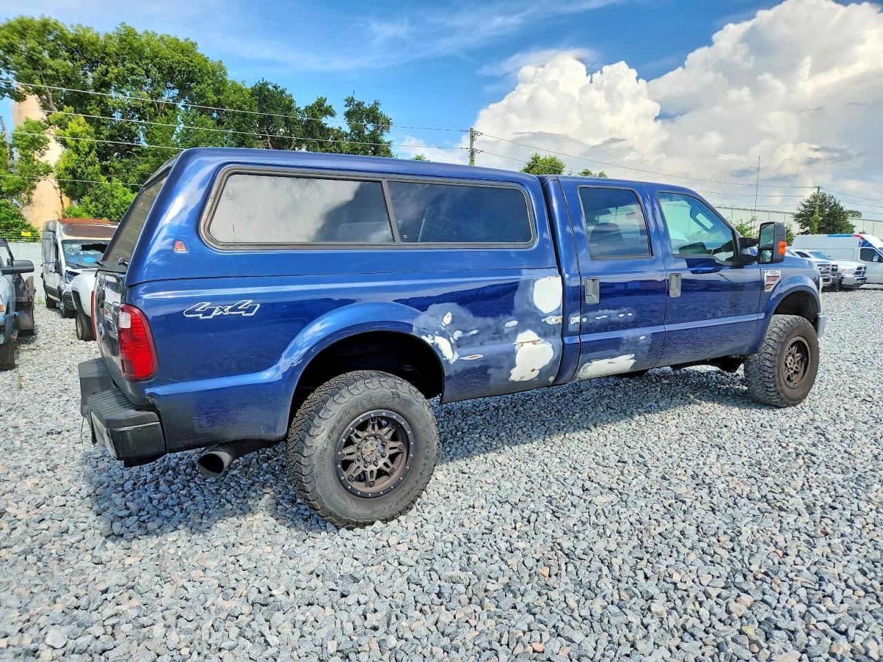 2010 Ford F-350 Super Duty VIN 1FTWW3BR8AEA98379 COPART salvage auction — Minor Dent/Scratches, FL - CERT OF TITLE SLVG REBUILDABLE, sold $2,700 on 2026-07-09 (photo 4)