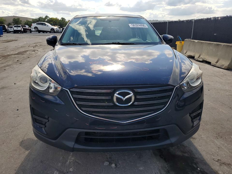 2016 Mazda Cx-5 VIN JM3KE2BY7G0656349 COPART salvage auction — REAR END, FL - CERT OF TITLE SLVG REBUILDABLE, sold $50 on 2026-07-23 (photo 5)