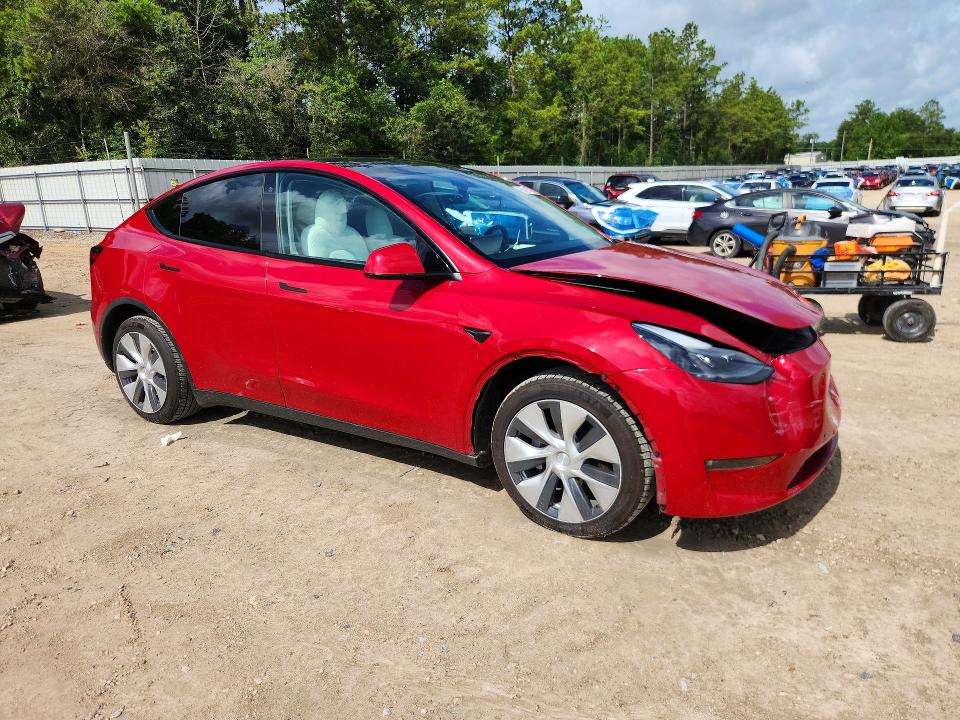 2022 Tesla Model y VIN 7SAYGDEE6NF559803 COPART salvage auction — FRONT END, FL - CERT OF TITLE SLVG REBUILDABLE, sold $6,100 on 2026-07-24 (photo 4)