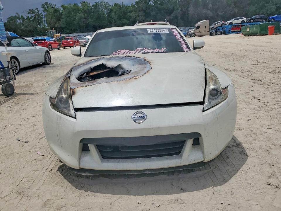 2010 Nissan 370z VIN JN1AZ4EH8AM506852 COPART salvage auction — ENGINE BURN, Fl - Cert Of Title Slvg Rebuildable, sold $725 on 2026-07-28 (photo 5)