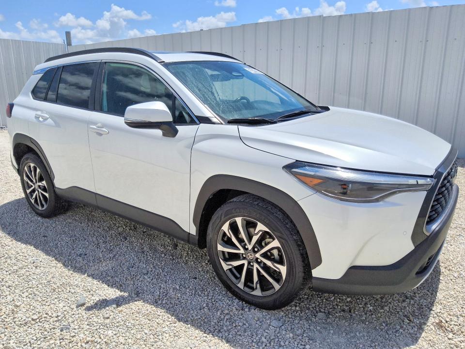 2023 Toyota Corolla cross VIN 7MUDAAAG4PV058951 COPART salvage auction — SIDE, NC - CERTIFICATE OF TITLE, sold $19,500 on 2026-07-14 (photo 4)