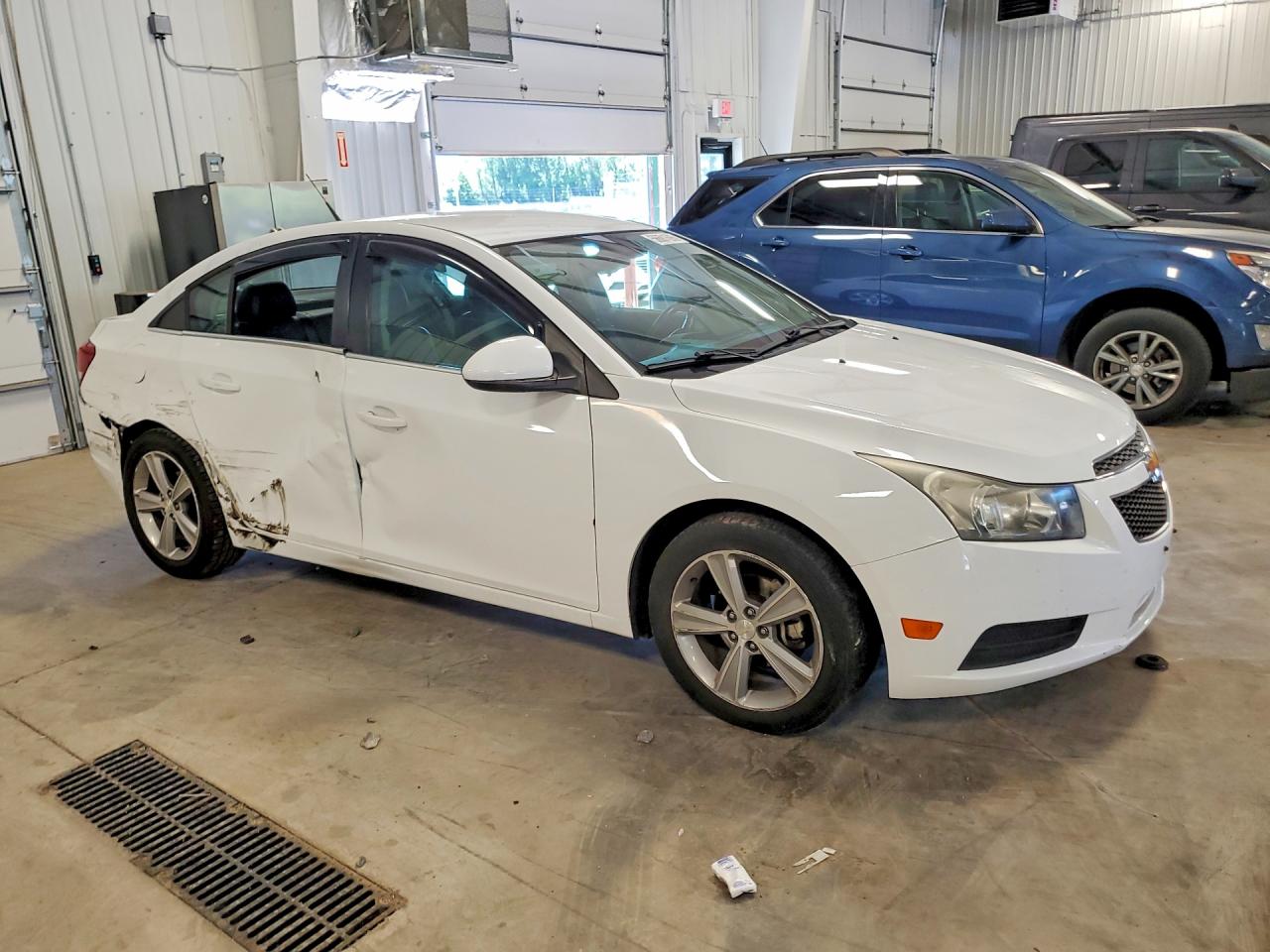 2013 Chevrolet Cruze VIN 1G1PE5SB7D7102297 COPART salvage auction — Hail, MN - CERT OF TITLE-SALVAGE, sold $750 on 2026-07-09 (photo 4)