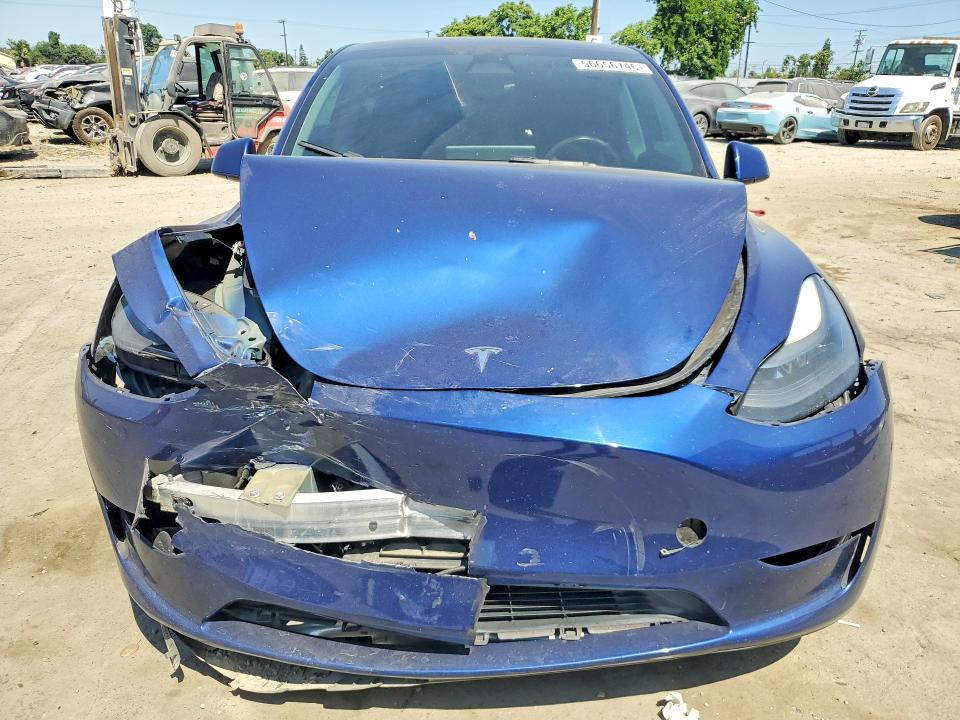 2023 Tesla Model y VIN 7SAYGDEF3PF599185 COPART salvage auction — FRONT END, Ca - Salvage Certificate, sold $7,700 on 2026-07-13 (photo 5)