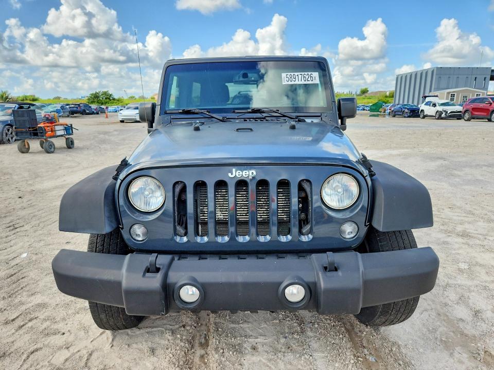 2016 Jeep Wrangler / VIN 1C4BJWDGXGL207228 COPART salvage auction — MINOR DENT/SCRATCHES, Vi - Clean Title (P), sold $5,600 on 2026-07-23 (photo 5)