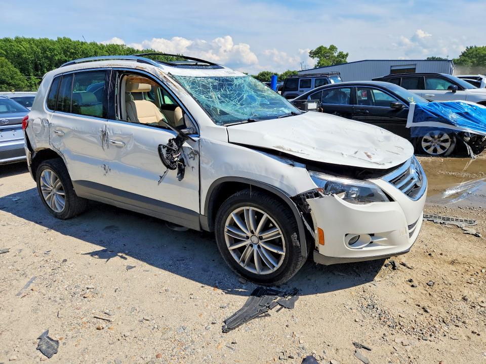 2011 Volkswagen Tiguan VIN WVGBV7AX3BW521837 COPART salvage auction — ROLLOVER, Va - Certificate Of Title, sold $125 on 2026-07-28 (photo 4)