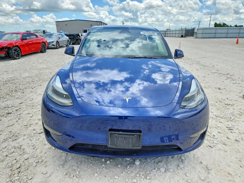 2024 Tesla Model y VIN 7SAYGAEEXRF115490 COPART salvage auction — SIDE, TX - SALVAGE VEHICLE TITLE (P), sold $13,700 on 2026-07-16 (photo 5)