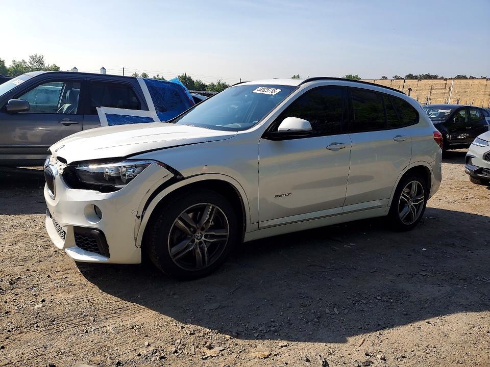 2018 BMW X1 VIN WBXHT3C31J5K24029 — COPART salvage auction photo